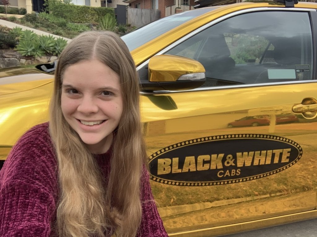 Black & White Cabs Good as Gold Young Woman