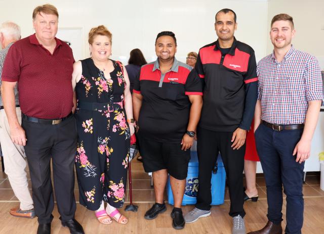 Malcolm and Wendy Lamb, Jitender Singh, Gagan Deep and Dillon Clendinning at the opening of Black and White Cabs' new Central Queensland regional office.